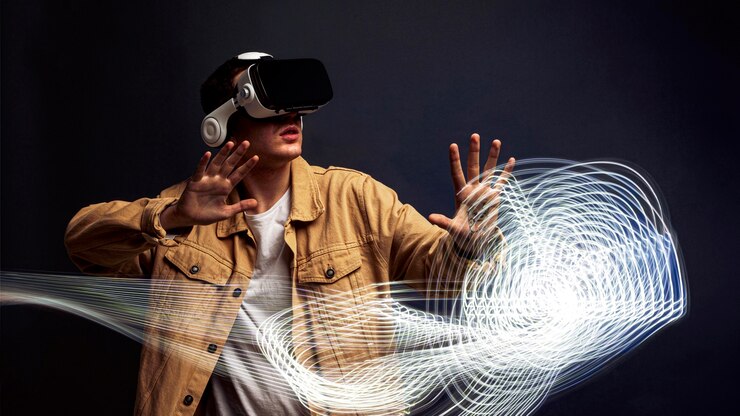 man-wearing-virtual-reality-goggles-with-special-effects-around-him_23-2148815725 man-wearing-virtual-reality-goggles-with-special-effects-around-him_23-2148815725
