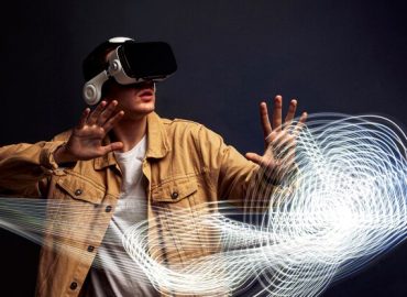 man-wearing-virtual-reality-goggles-with-special-effects-around-him_23-2148815725